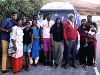 Tempo Traveller with customer
